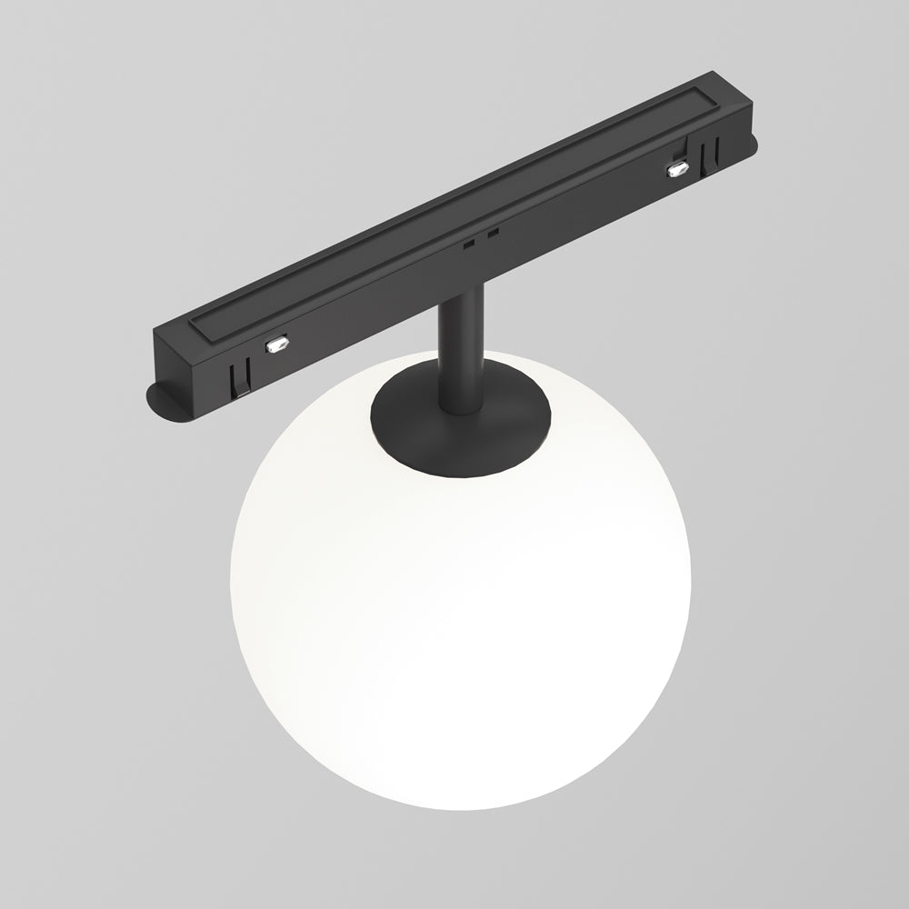 Vue de dessus montrant l'adaptateur de rail noir et le globe en dessous