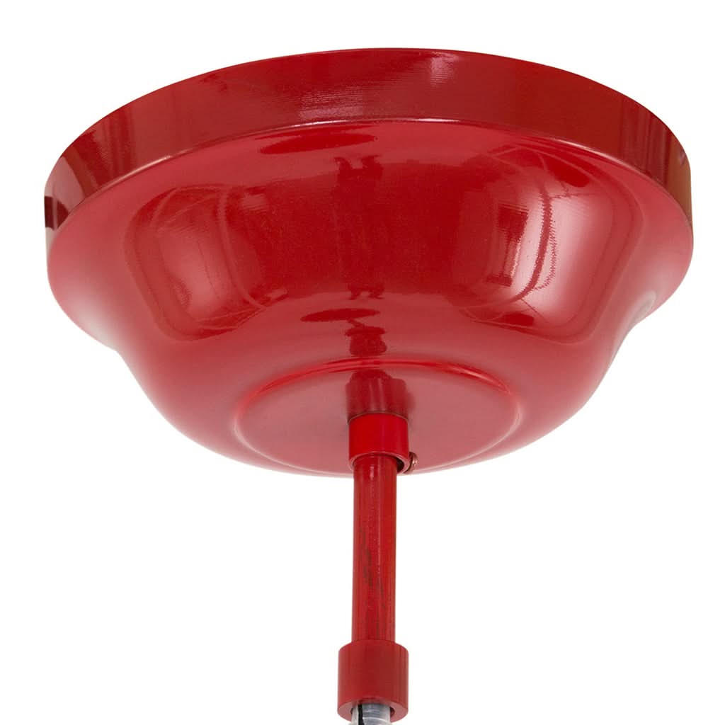 Vue rapprochée de la rosace de plafond rouge, câble et douille de fixation.