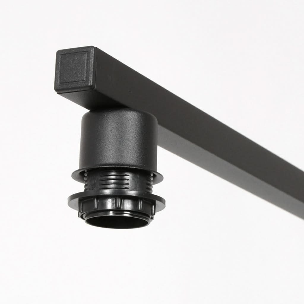 Détail de la douille E27 noire et de la barre métal de la suspension Velsa