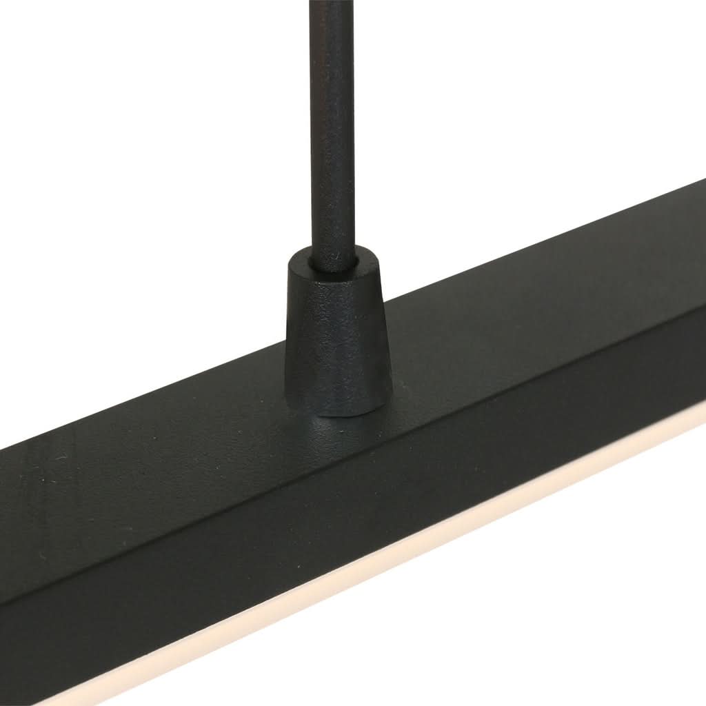 Détail de la finition : fixation du câble et diffuseur blanc sous la barre.