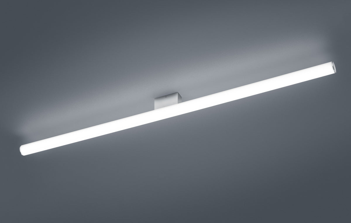 Vue en plongée depuis le plafond, diffuseur blanc et fixation centrale apparente