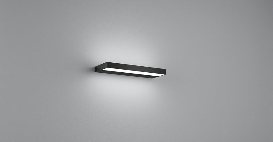 Vue rapprochée du caisson noir diffusant une lumière blanche en dégradé