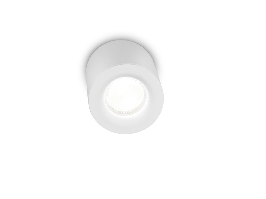 Vue de dessous montrant la lentille lumineuse et les inscriptions sur la collerette blanche