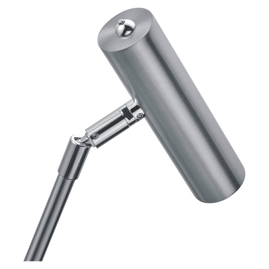 Détail de l’articulation et de la tête cylindrique, montrant la finition nickel satiné.