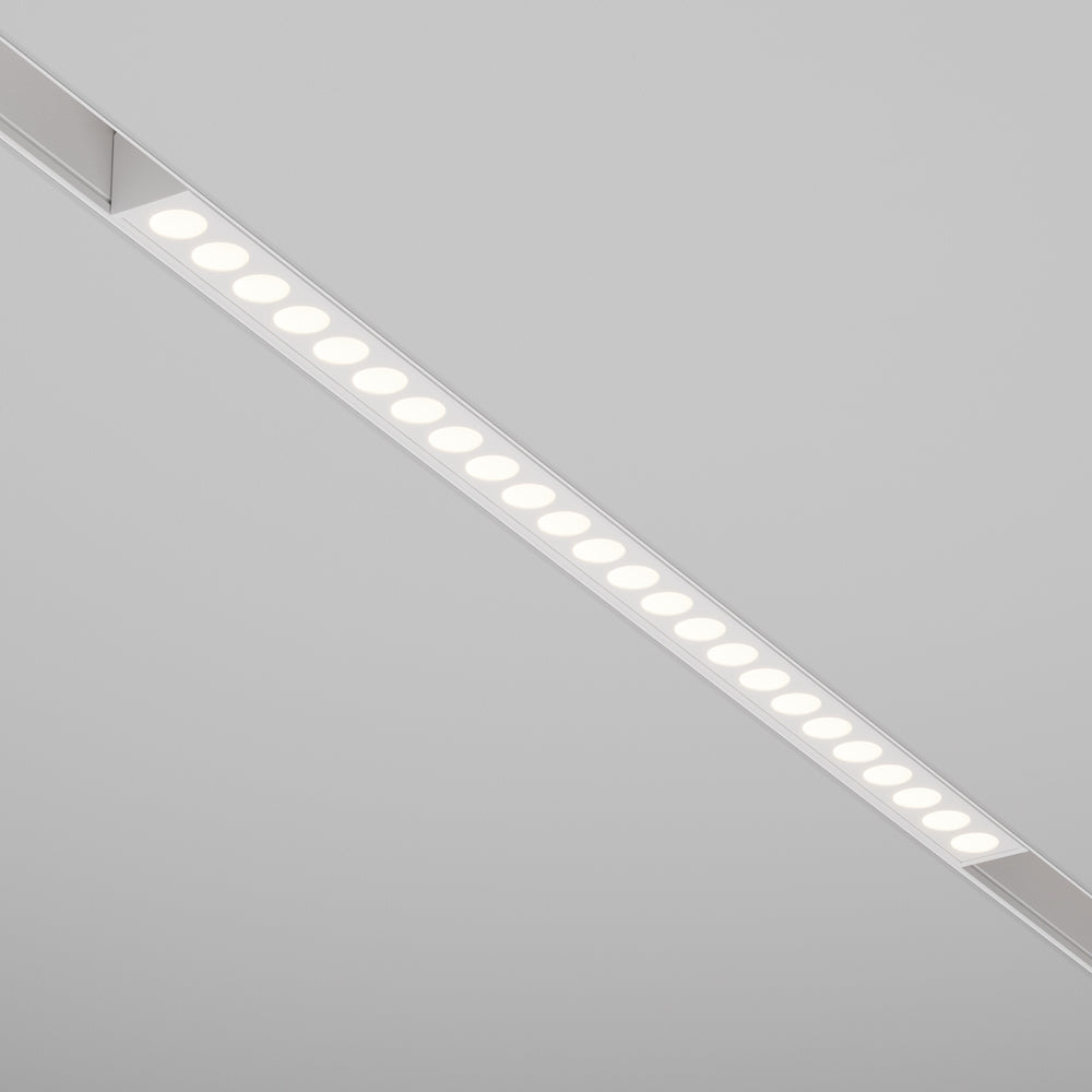 Vue en perspective du profil linéaire blanc avec sa rangée de pastilles lumineuses régulières.