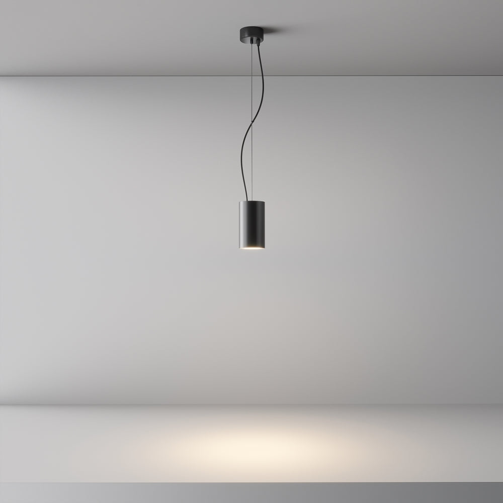 Mise en ambiance montrant le faisceau lumineux projeté sur le mur