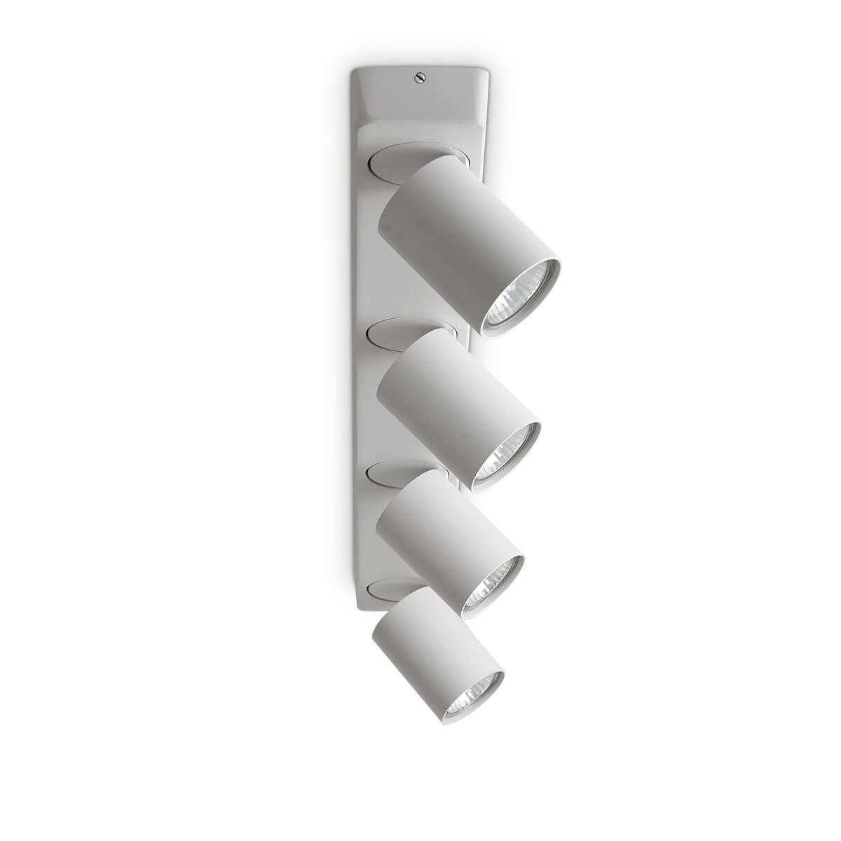 Vue de côté du luminaire blanc, spots cylindriques inclinés montrant leur orientation réglable.