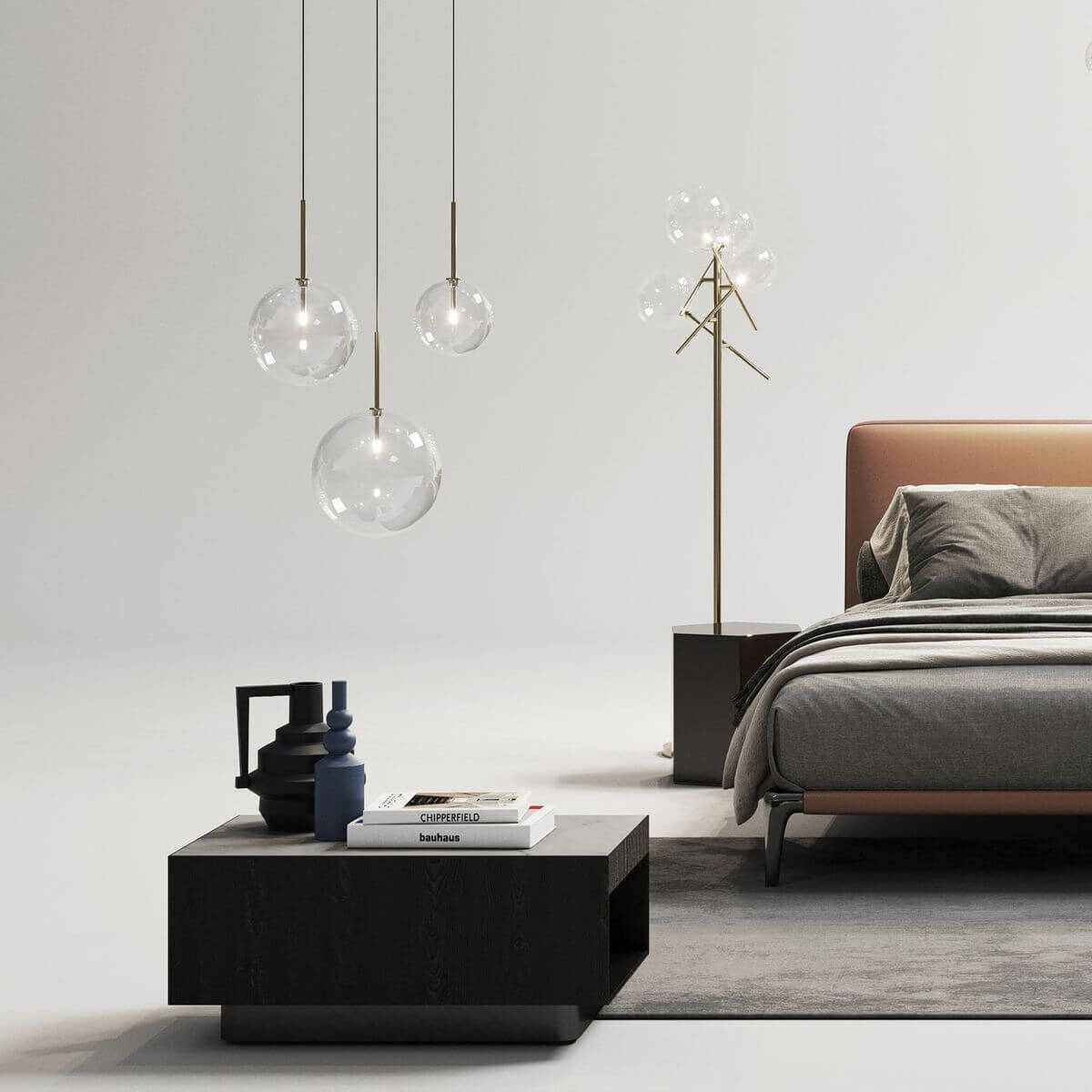 Chambre moderne avec suspensions en verre et lampadaire à globes éclairés près du lit.