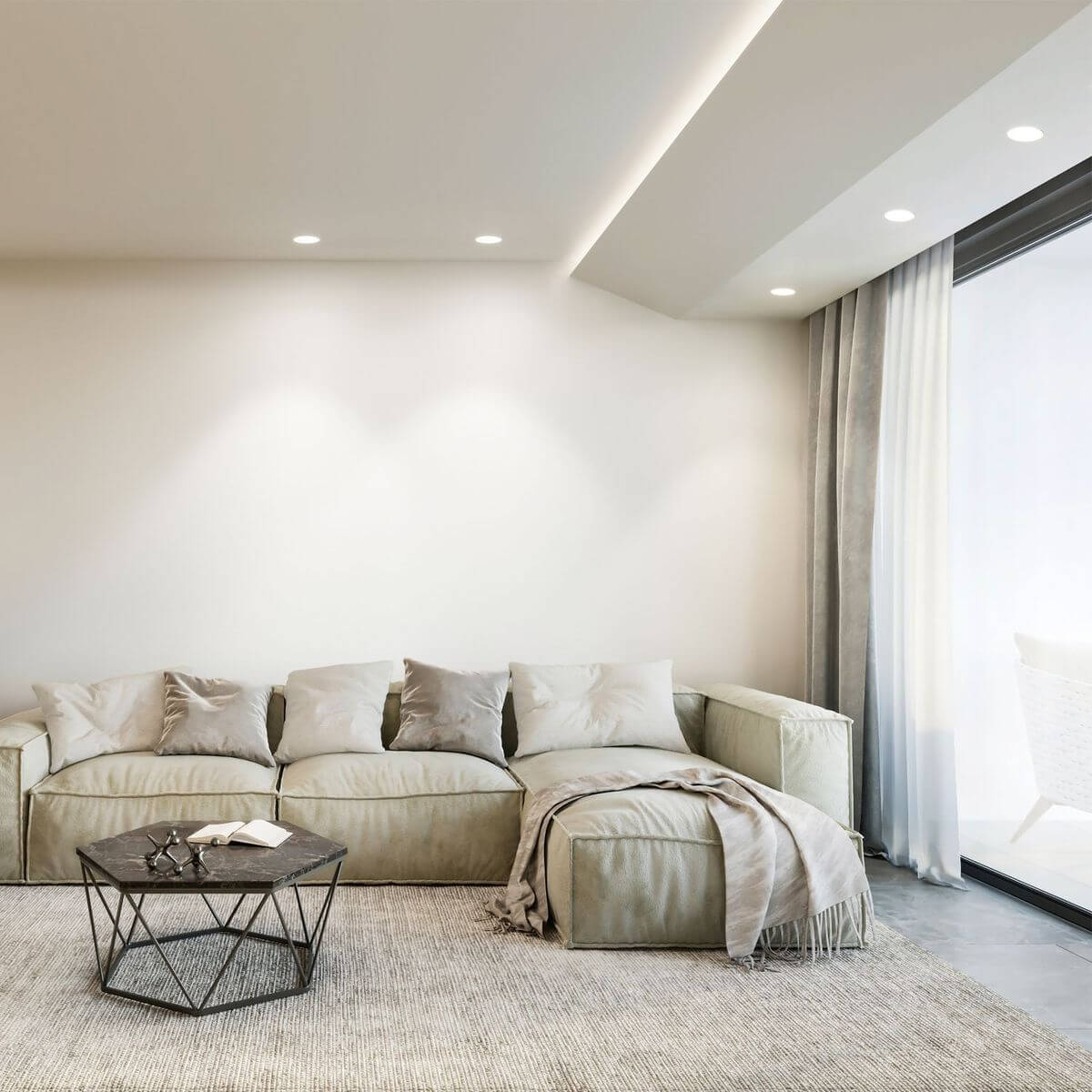 Mise en ambiance d'un salon moderne avec plusieurs spots encastrés au plafond blanc