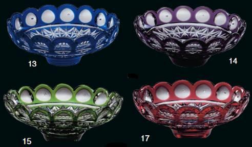 Nuancier de quatre coupelles colorées : bleu, violet, vert et rouge.