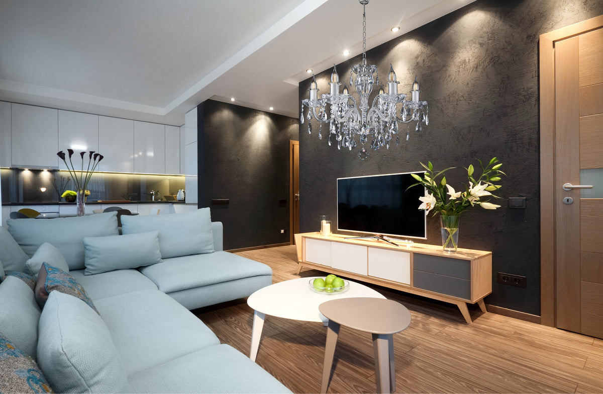 Mise en ambiance du lustre suspendu dans un séjour moderne au mur noir