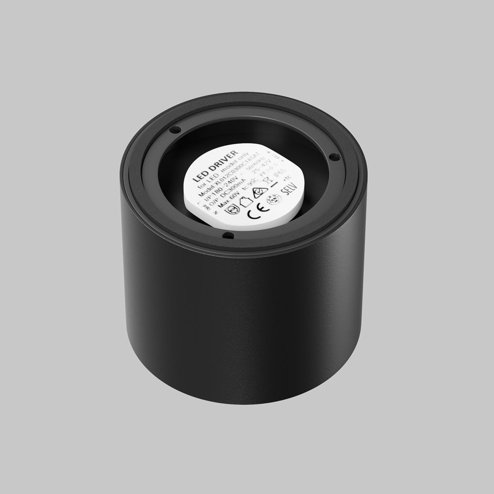 Vue de dessous montrant le driver LED blanc logé dans le corps cylindrique