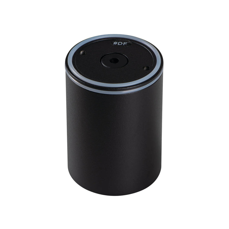 Vue de dessus du spot cylindrique noir montrant la platine de fixation et le joint.