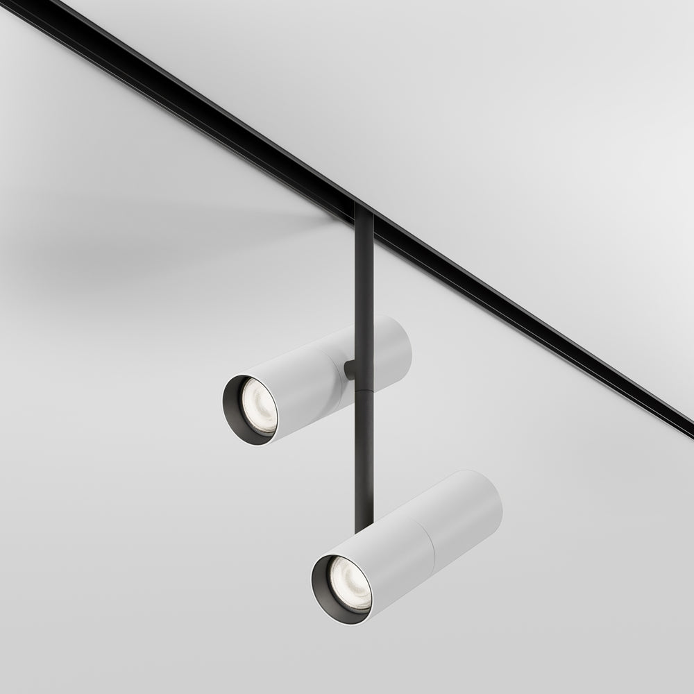Variante blanche du duo de spots orientables fixée sur rail noir