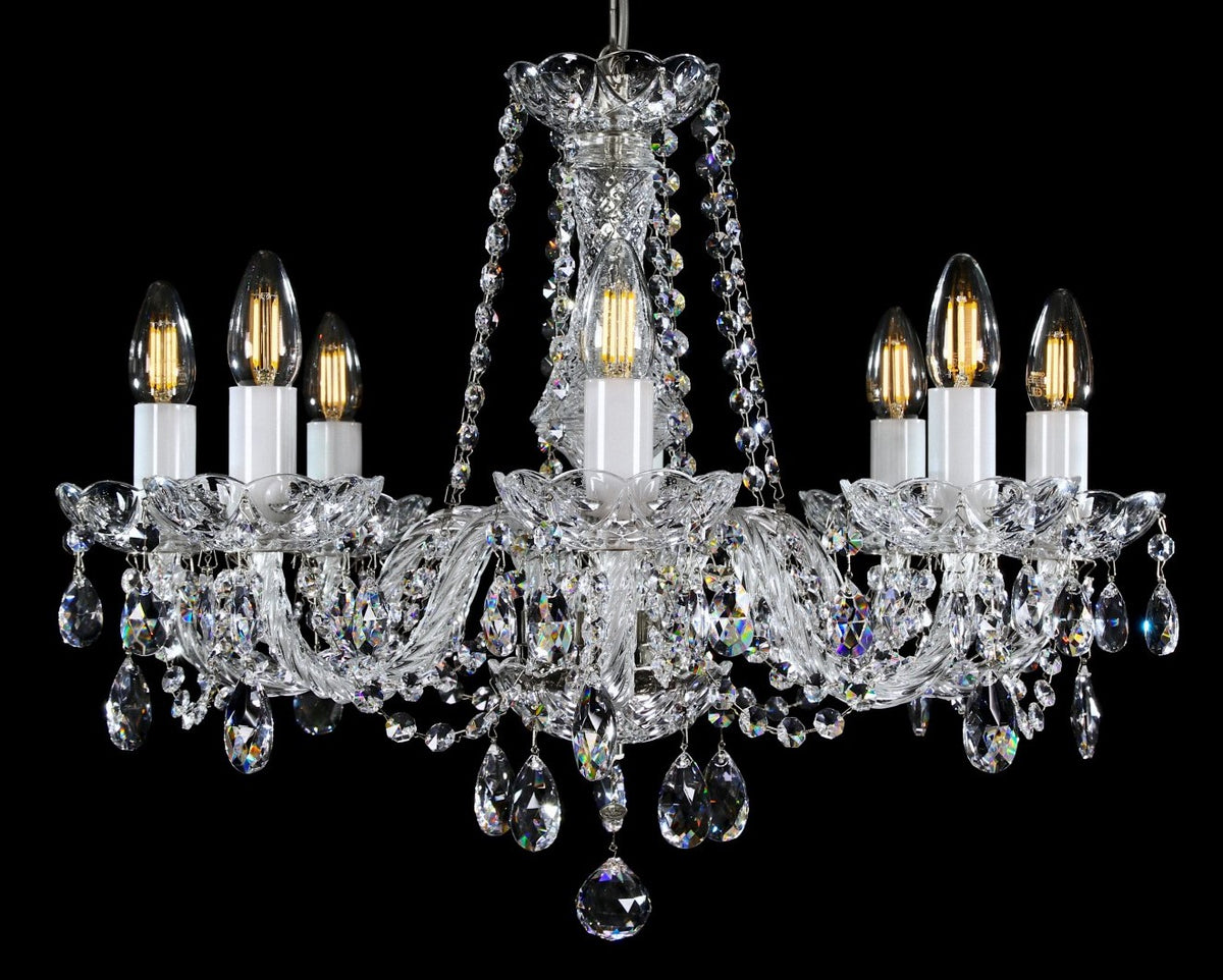 Même lustre avec monture argentée chromée, six bras et guirlandes de cristal scintillant