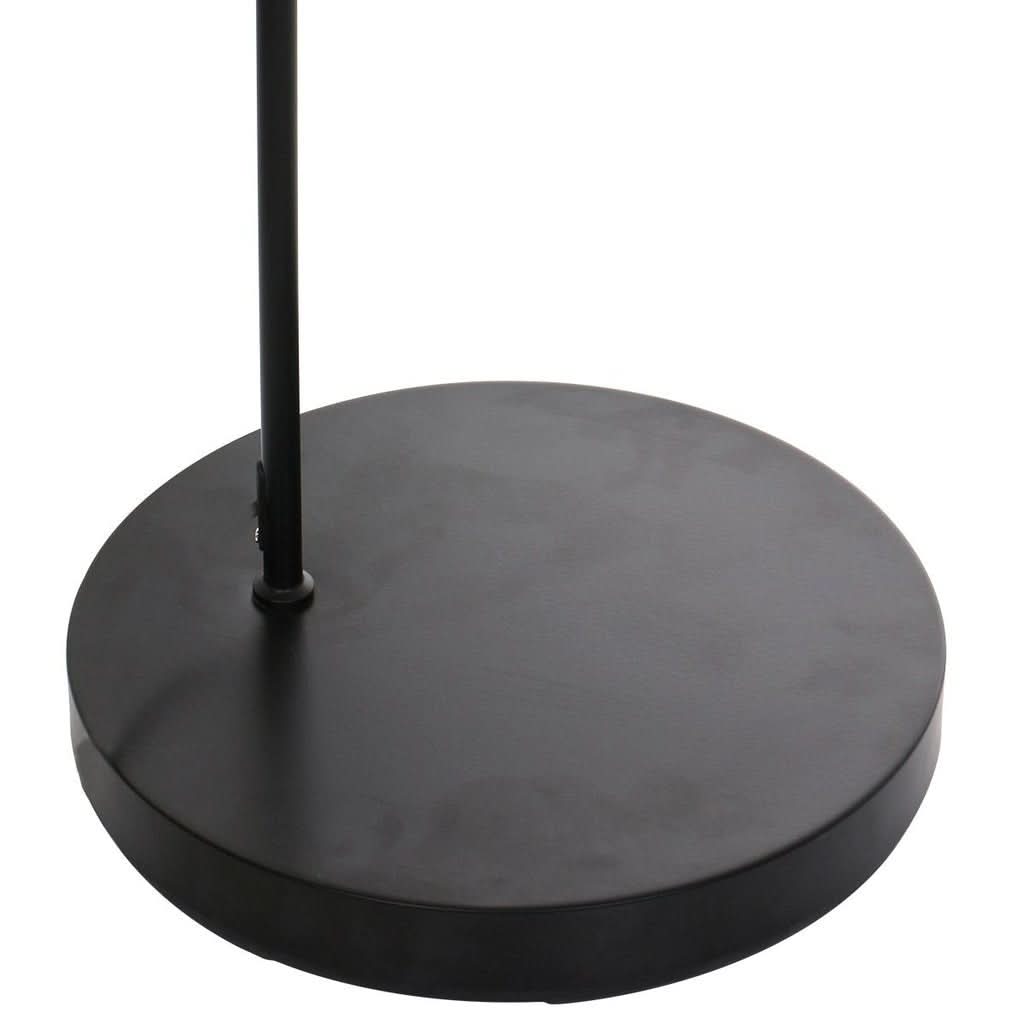 Gros plan de la base ronde noire plate reposant au sol