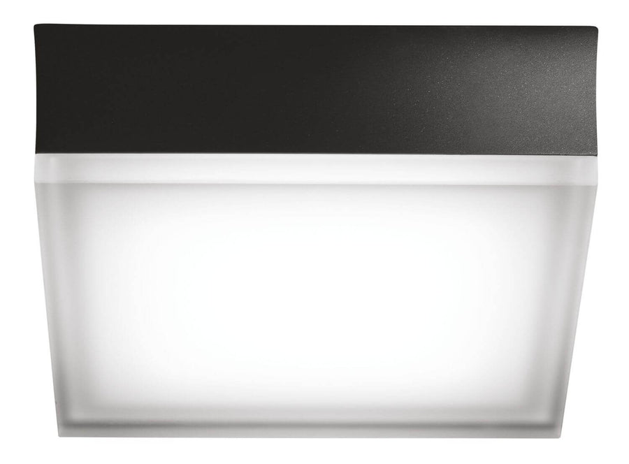 Vue de dessous : boîtier anthracite coiffant un diffuseur carré blanc lumineux