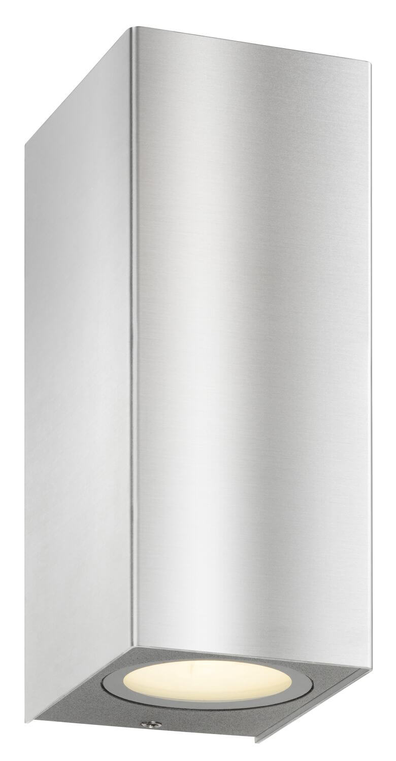Produit de face allumé, halo blanc chaud sous le boîtier inox