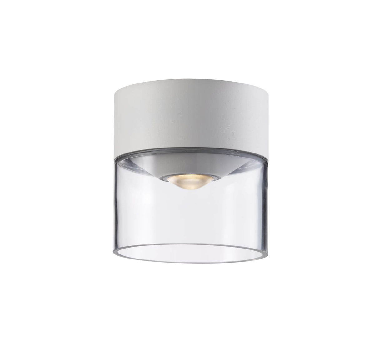 Plafonnier allumé, ampoule dorée visible sous le diffuseur en verre transparent