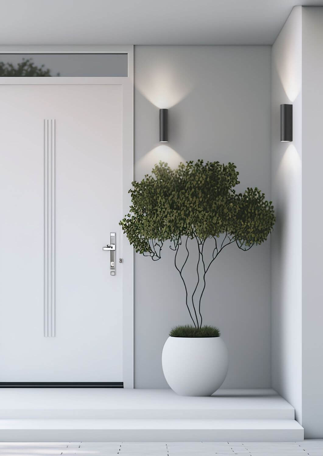 Mise en ambiance extérieure de l'applique anthracite éclairant un mur clair