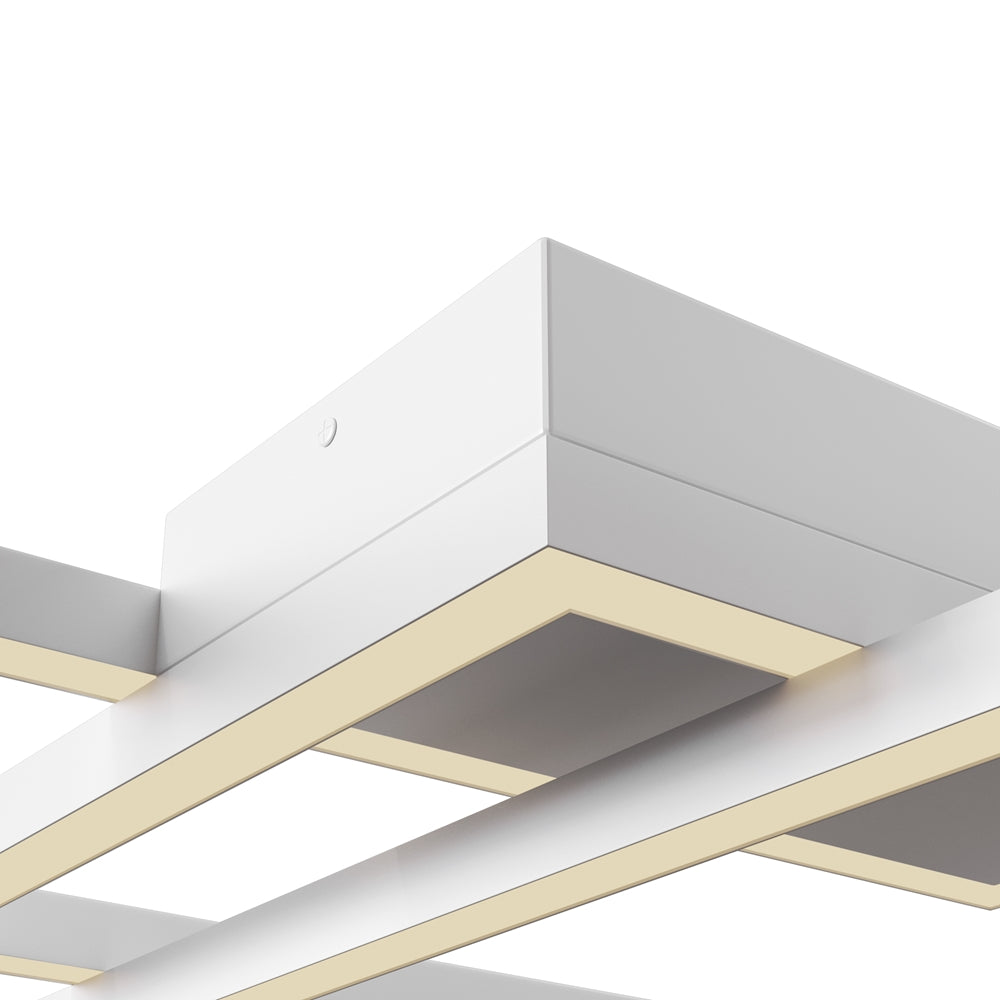 Détail du boîtier central blanc et des profilés lumineux au liseré doré