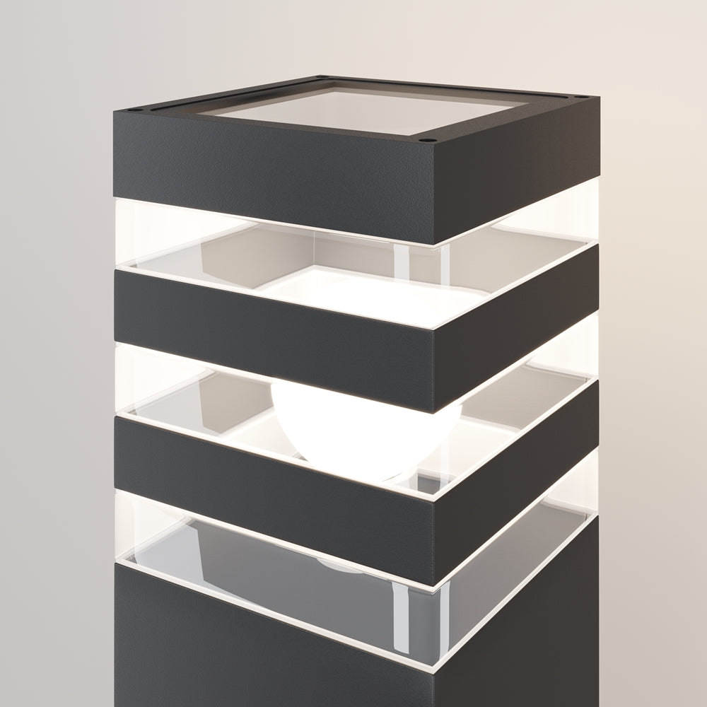 Gros plan du sommet dévoilant diffuseur blanc et bandes de verre superposées.