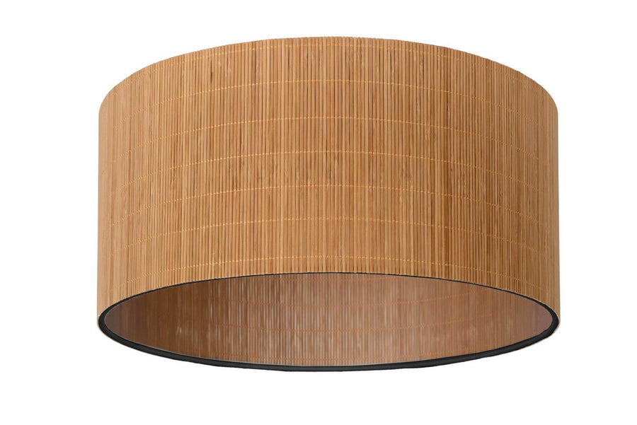 Vue de trois quarts du plafonnier cylindrique avec bordure noire et lueur intérieure.