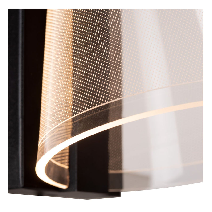 Détail rapproché du tissu perforé et du ruban LED près du support