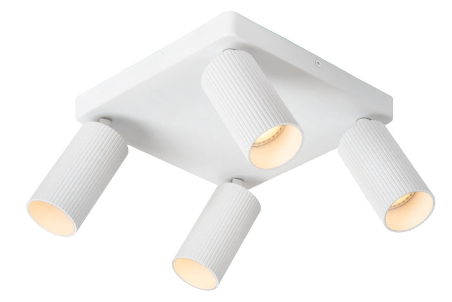 Autre angle de vue du luminaire blanc avec ses quatre projecteurs cylindriques allumés.