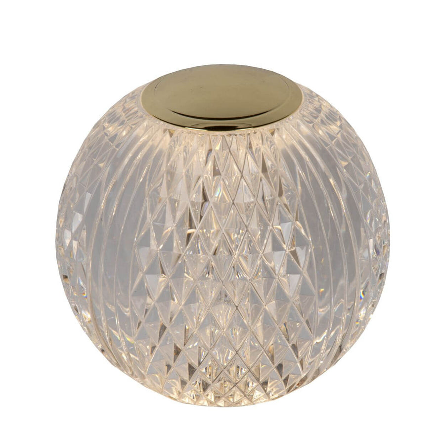 Produit de face sur fond blanc, verre transparent diamanté et couvercle doré.