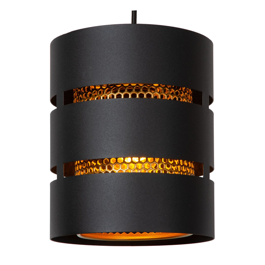 Détail d'un abat-jour cylindrique noir avec bandes dorées perforées et nid d'abeille.