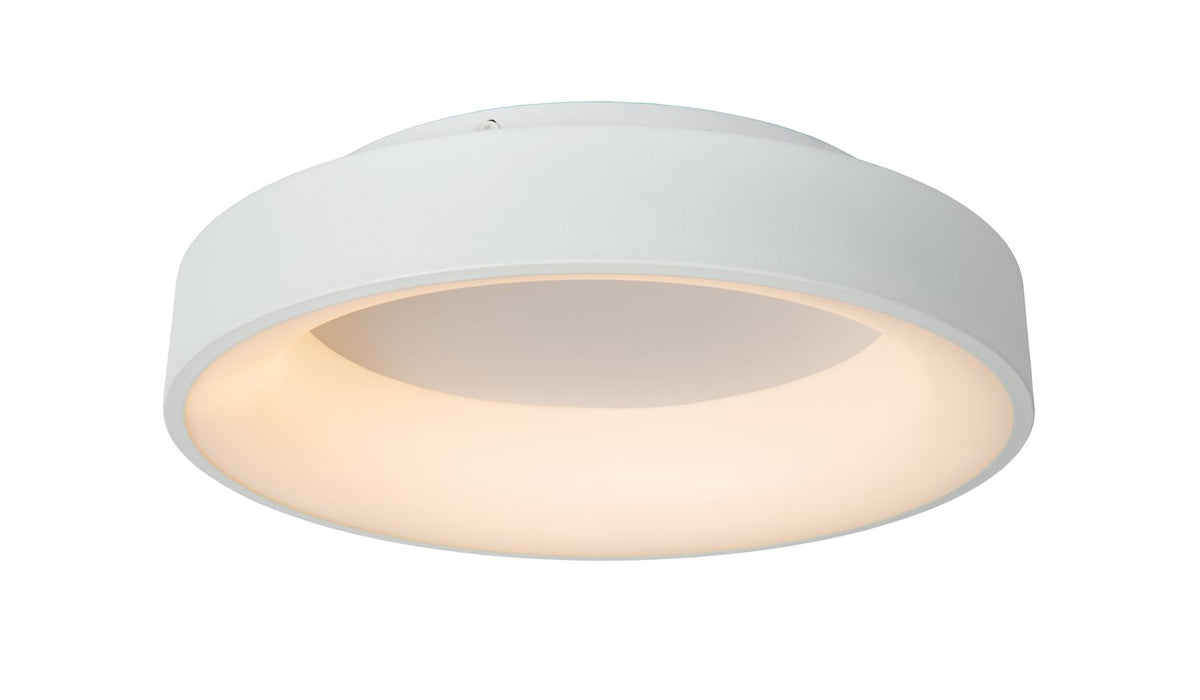 Vue de dessous sur fond blanc, corps cylindrique blanc et diffuseur lumineux