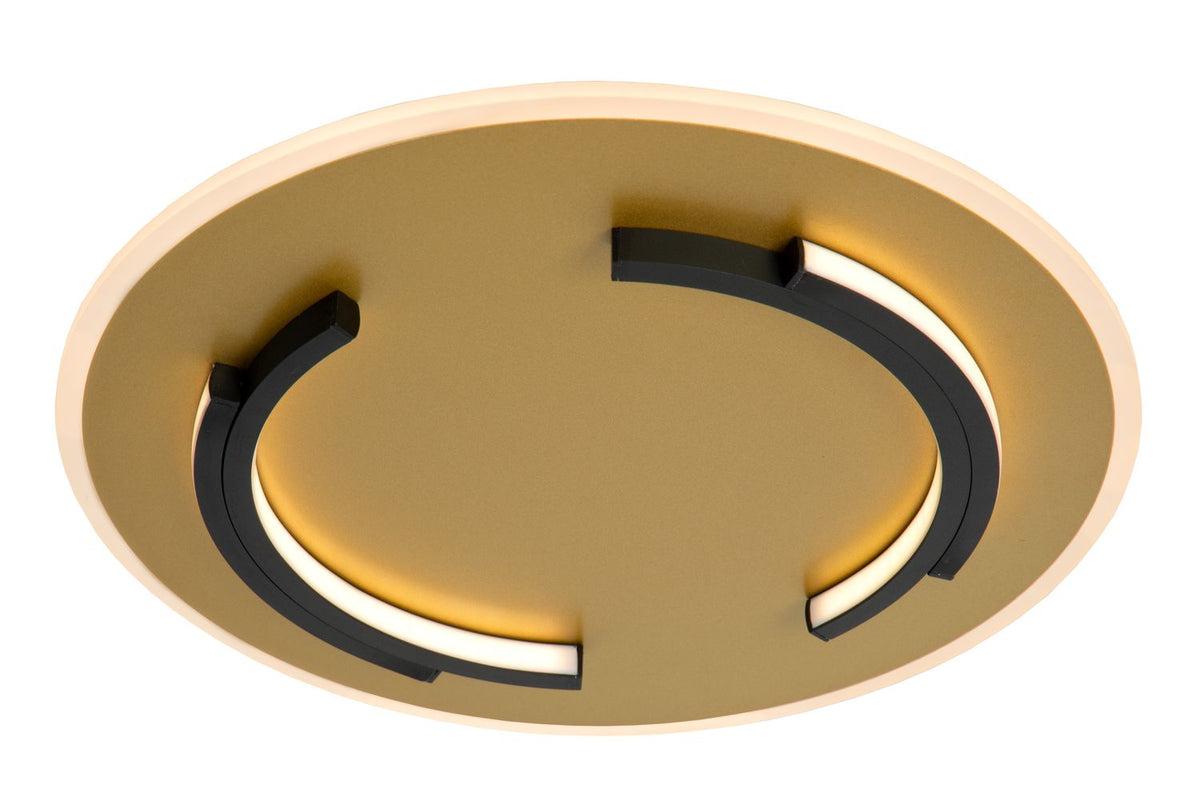 Vue de dessous montrant les anneaux LED spiralés sur disque doré mat
