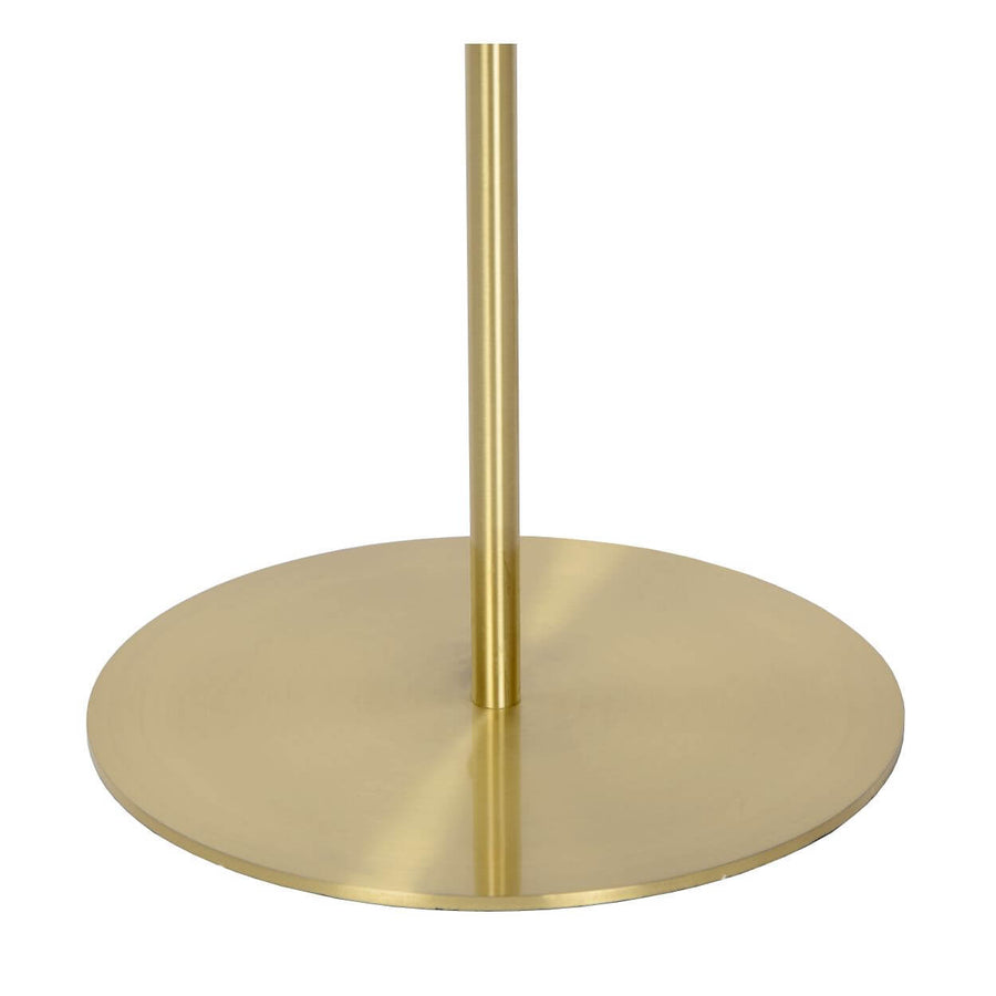 Détail de la base ronde et dorée ainsi que du pied vertical du lampadaire