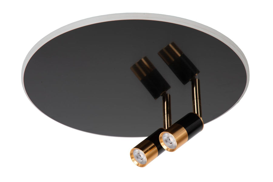 Produit éteint sur fond blanc, détail des spots cylindriques orientables