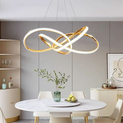 Modernistischer Art-Déco-Kronleuchter YALO - Spiraldesign, verchromtes Gold, LED