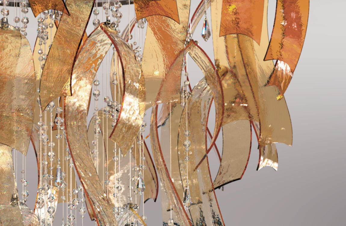 Détail de finition : rubans dorés translucides, reflets métallisés et chaînettes de cristal taillé.
