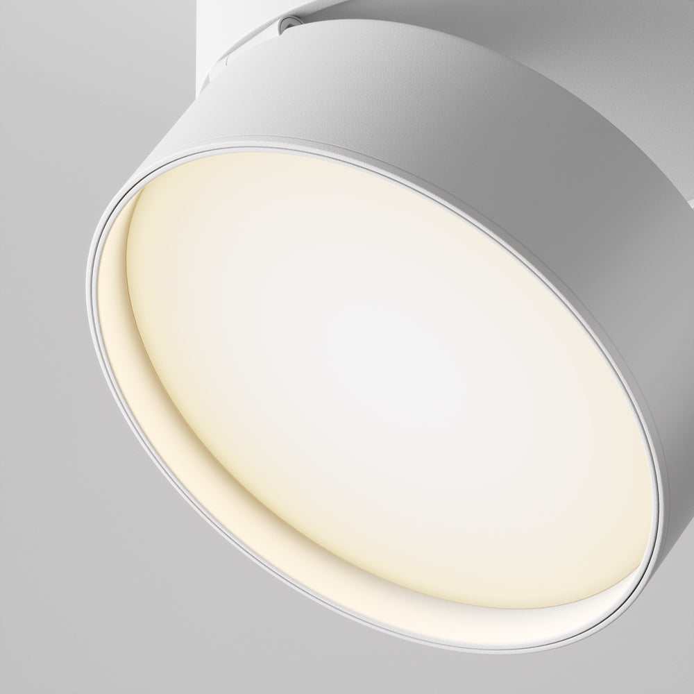 Gros plan sur la face lumineuse blanche et sa finition lisse