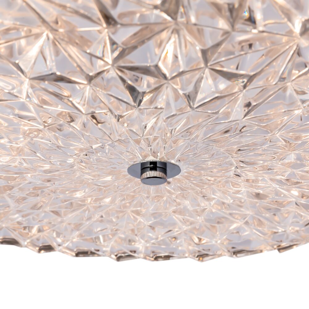 Détail du dessous montrant le diffuseur en cristal à facettes triangulaires