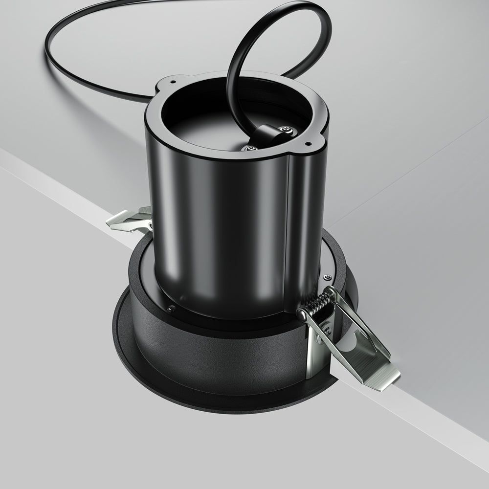 Corps du luminaire retourné, ressorts de fixation apparents pour montage encastré