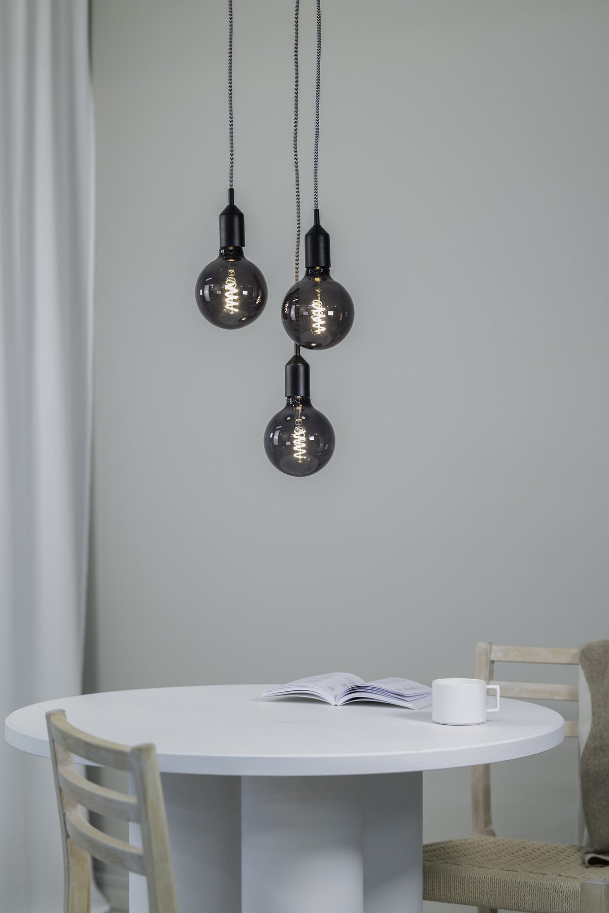 Suspension Bronx sur platine ronde