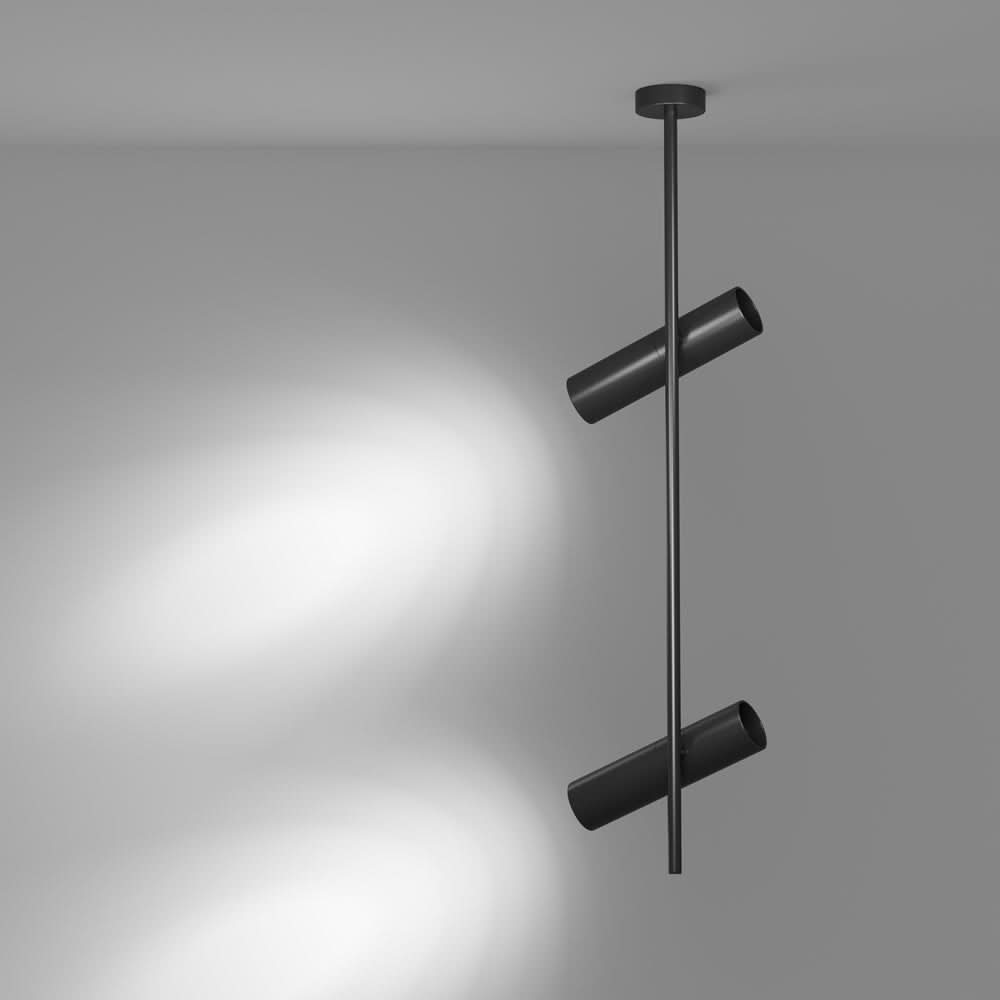 Mise en ambiance sur mur gris avec deux faisceaux lumineux projetés