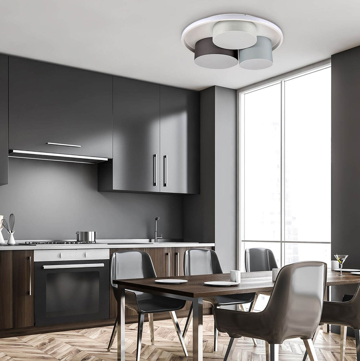 Vue rapprochée du plafonnier dans une cuisine contemporaine, abat-jours cylindriques gris et blancs