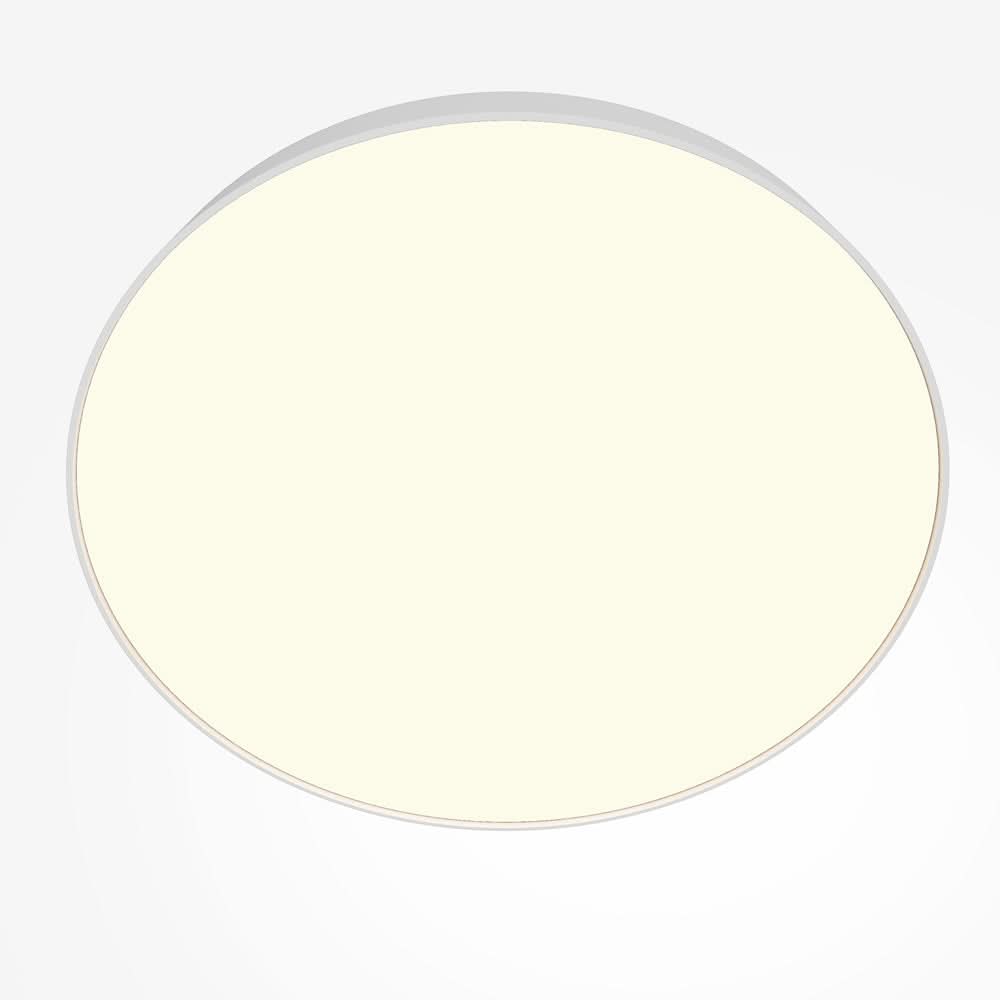 Vue de dessous du diffuseur rond ivoire éclairé, sans cadre visible