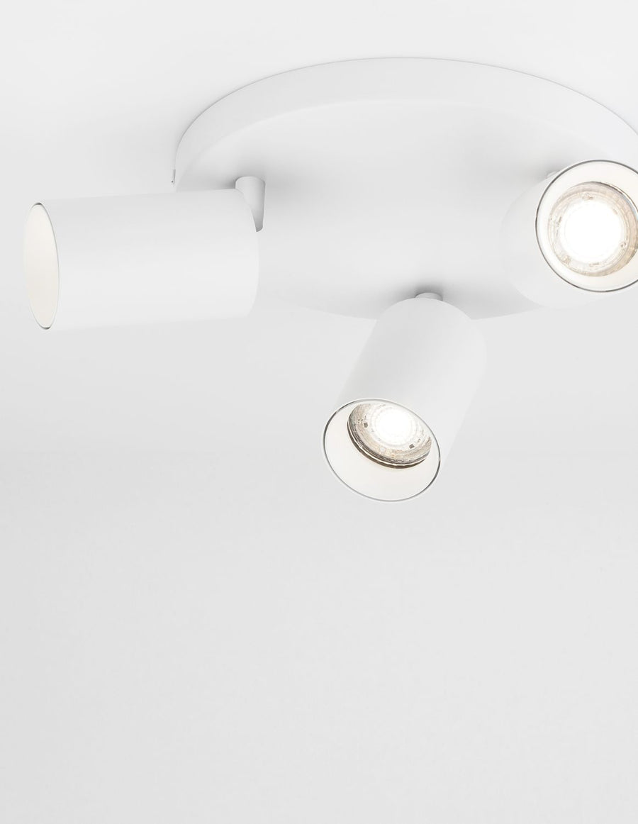 Détail des modules LED et lentilles dans les cylindres blancs
