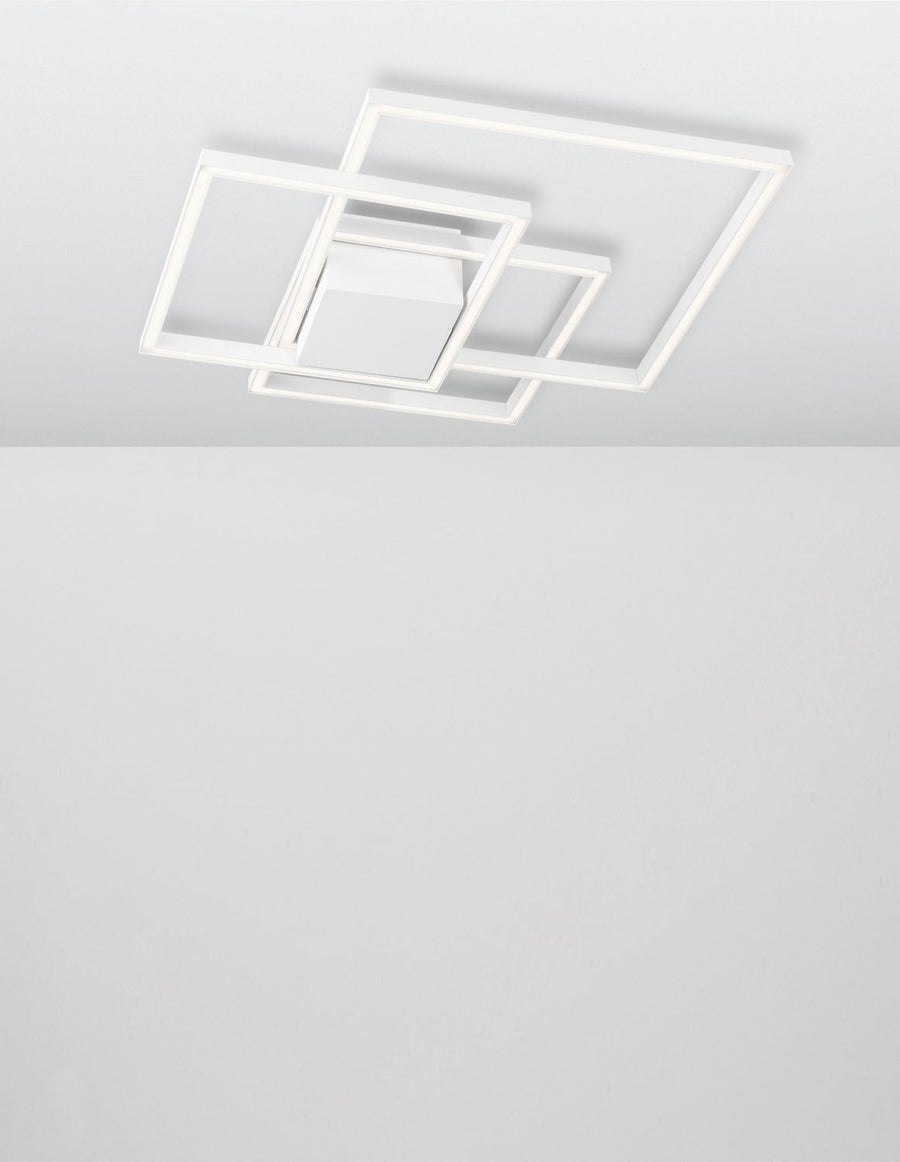 Luminaire fixé au plafond blanc, vue frontale montrant les cadres rectangulaires imbriqués