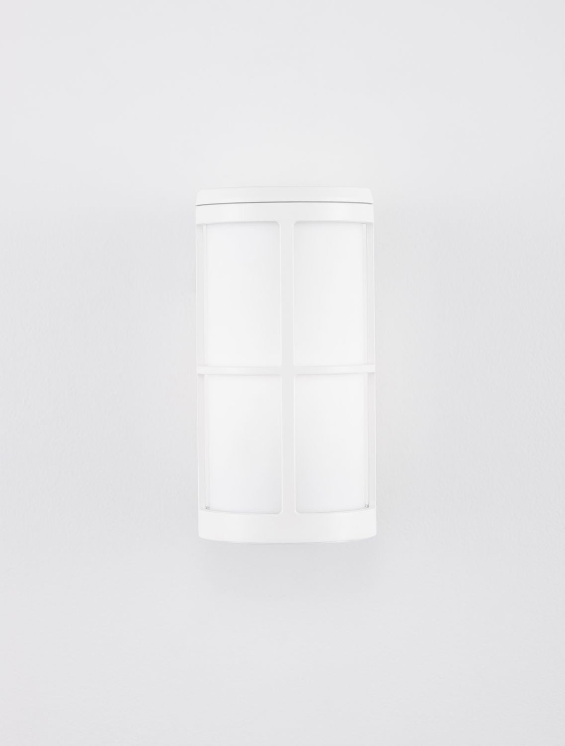Vue frontale légèrement rapprochée du bloc lumineux cylindrique blanc