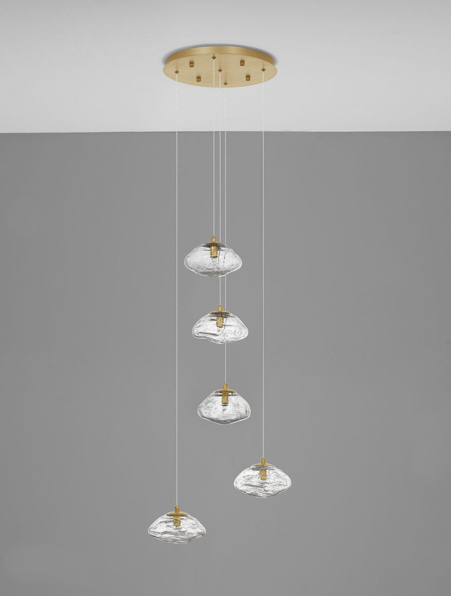 Présentation du luminaire complet, disposition des abat-jours de verre soufflé.