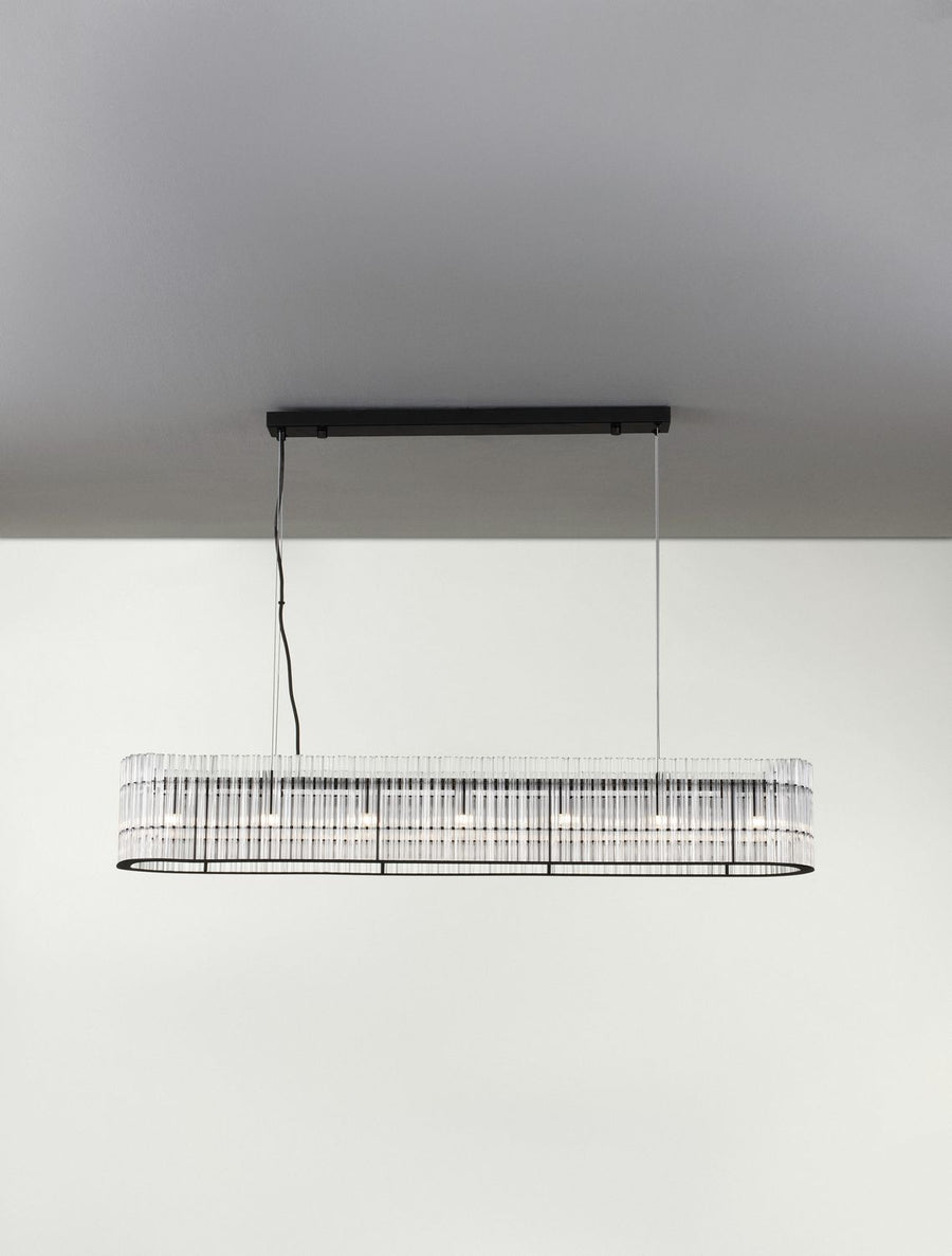 Vue frontale allumée, halo lumineux traversant les tubes de verre transparents