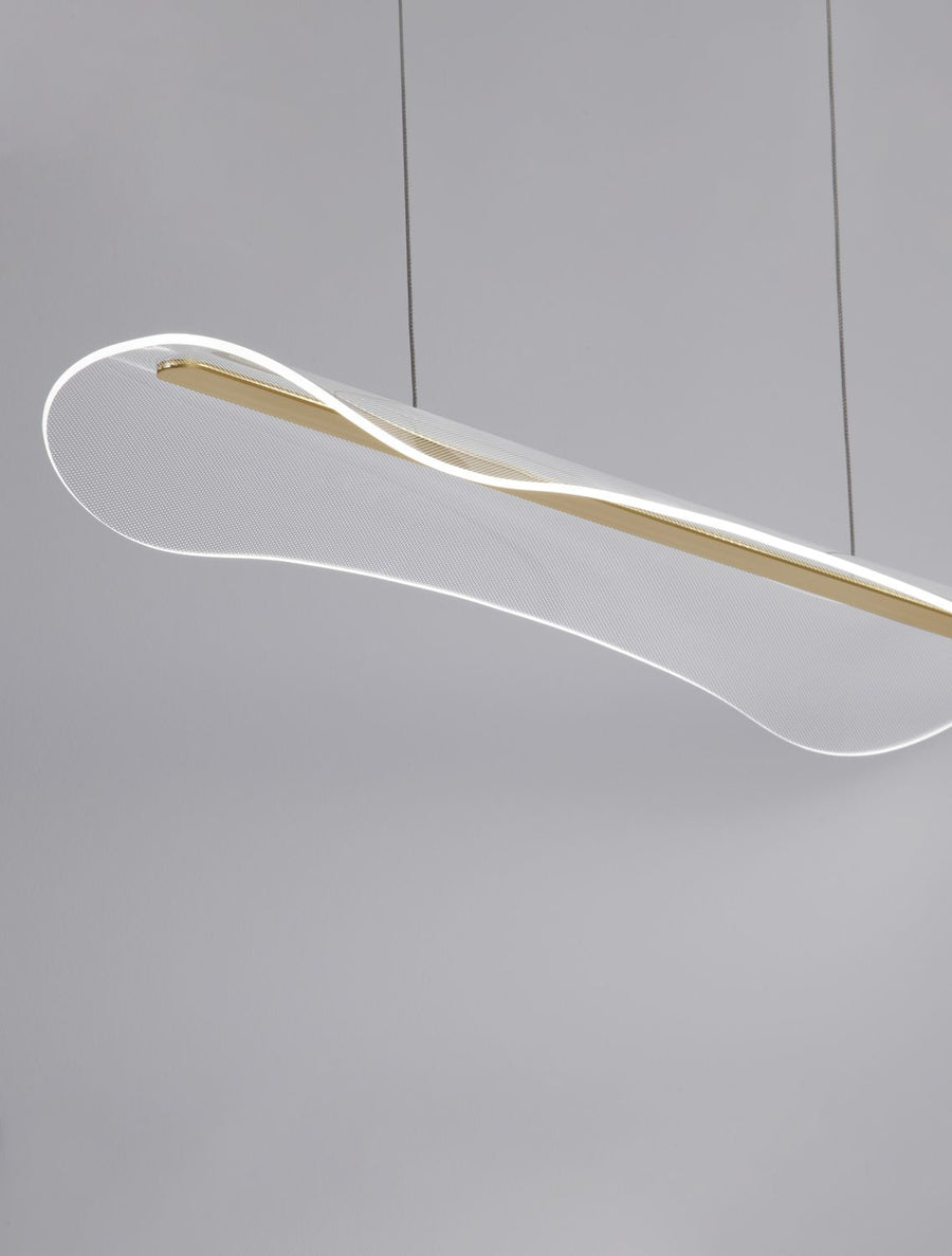 Détail de la finition dorée et du diffuseur tressé translucide